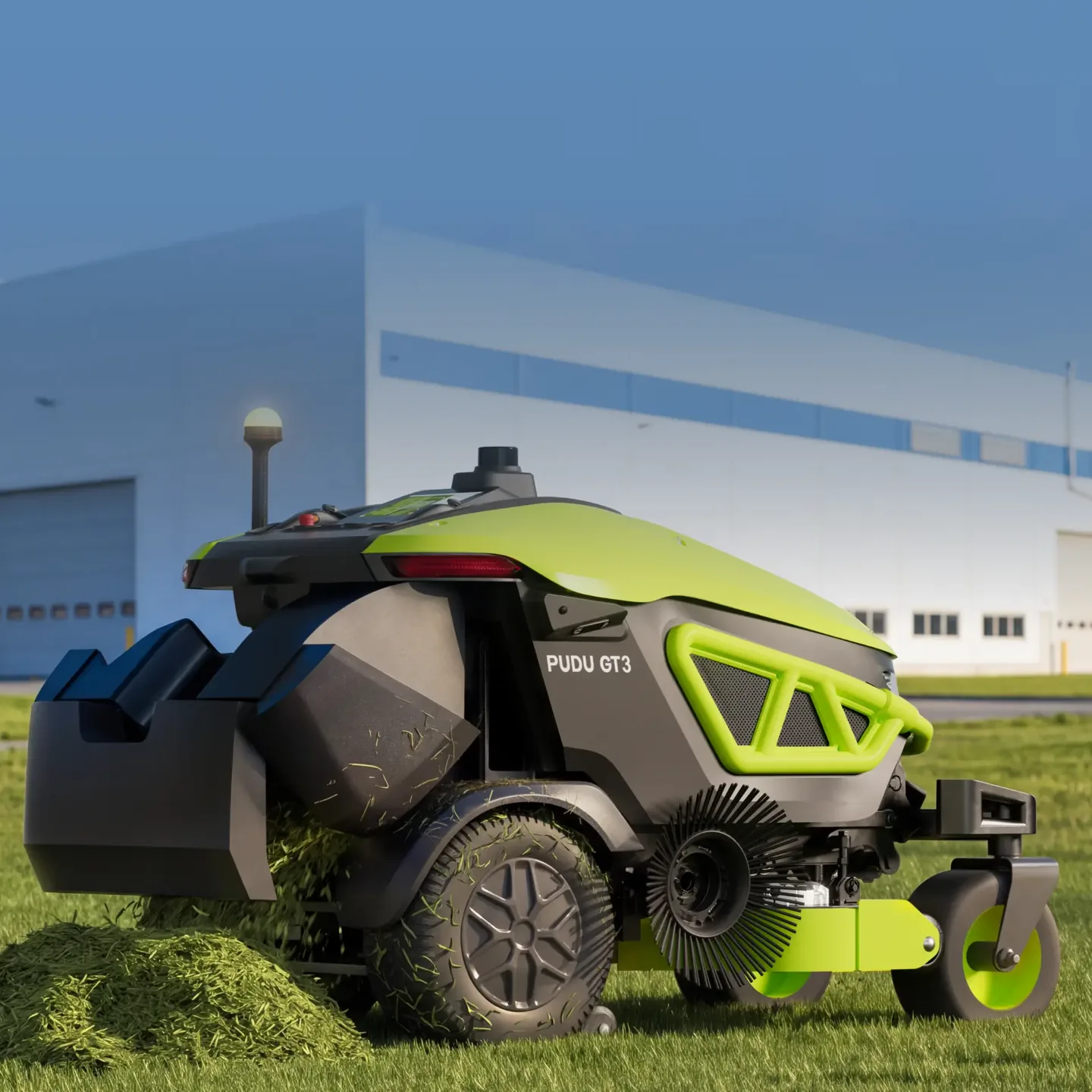 Fabrika binası önünde kesilen çimi boşaltan PUDU GT3